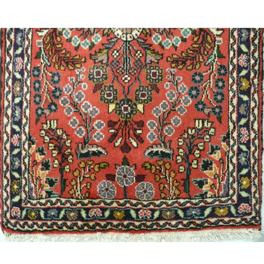Another close-up of the Persian Darjazin runner rug, focusing on the fine details and rich colors of the design.