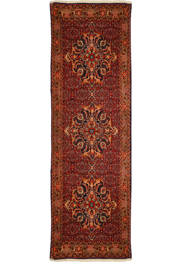 Full-length view of a 3 x 10 Persian Bijar Runner with intricate red, blue, and cream patterns