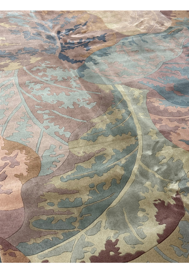 Medium shot of the Modern Art Deco Beijing rug, focusing on the artistic leaf design and the natural color scheme