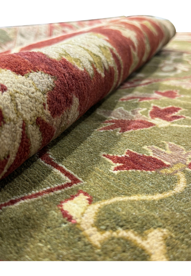 Corner detail of a 10x15 Chobi Peshawar rug, displaying the finesse of its intricate patterns