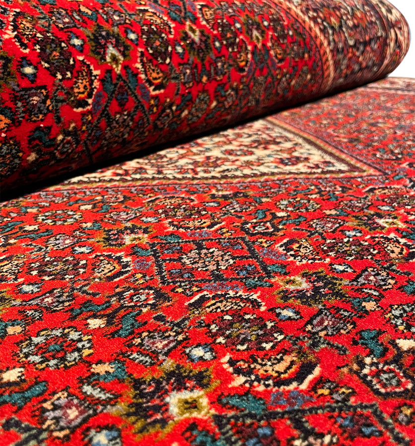 Close-up of the Persian Bijar rug's texture, showing the tight weave and quality of the wool.