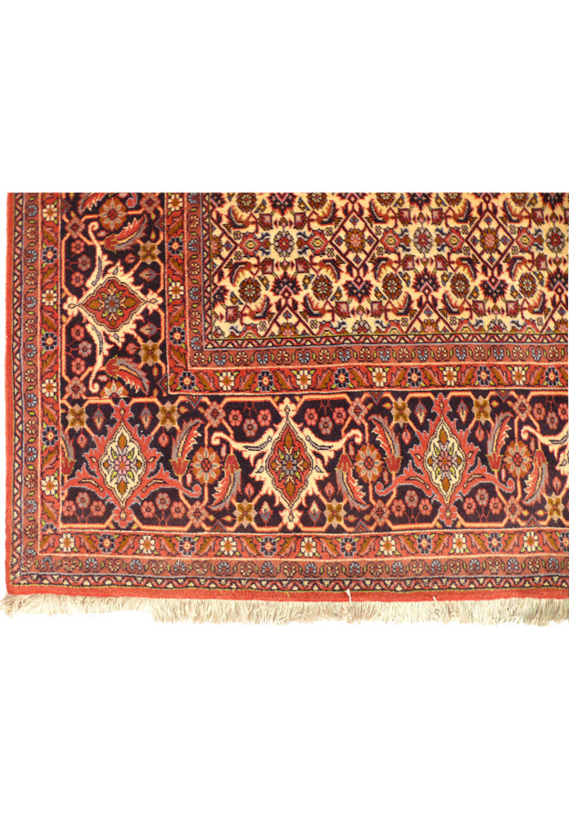 The underside of the Persian Bijar Iron Rug, showing the sturdy construction and the reverse pattern visible through the tight weave, indicative of the rug's quality.