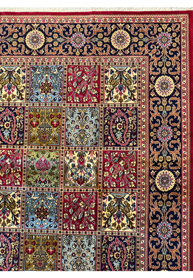 A close look at the intricate weaving and color detail of each panel on a 8 x 11 Persian Qum Kork rug, with floral and geometric designs