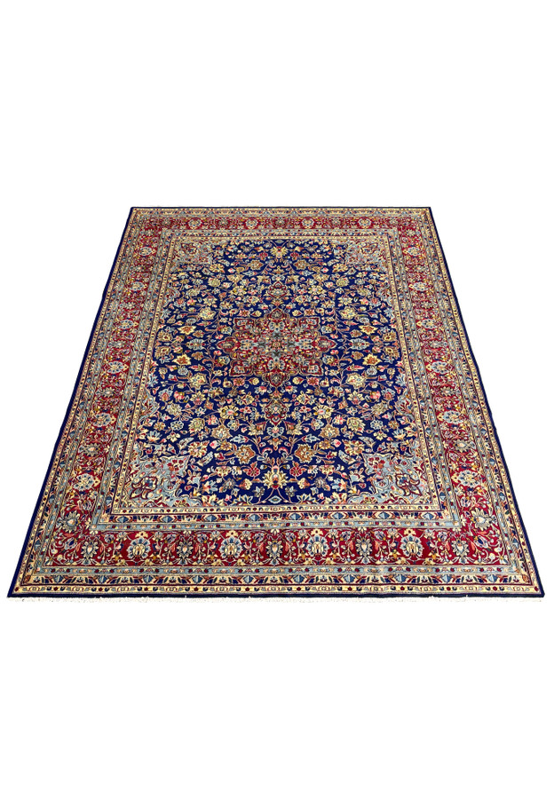 Full view of a 10 x 13'6 Persian Kerman Rug, highlighting the central medallion and the surrounding floral designs, reflecting high-quality craftsmanship and a rare, intricate design