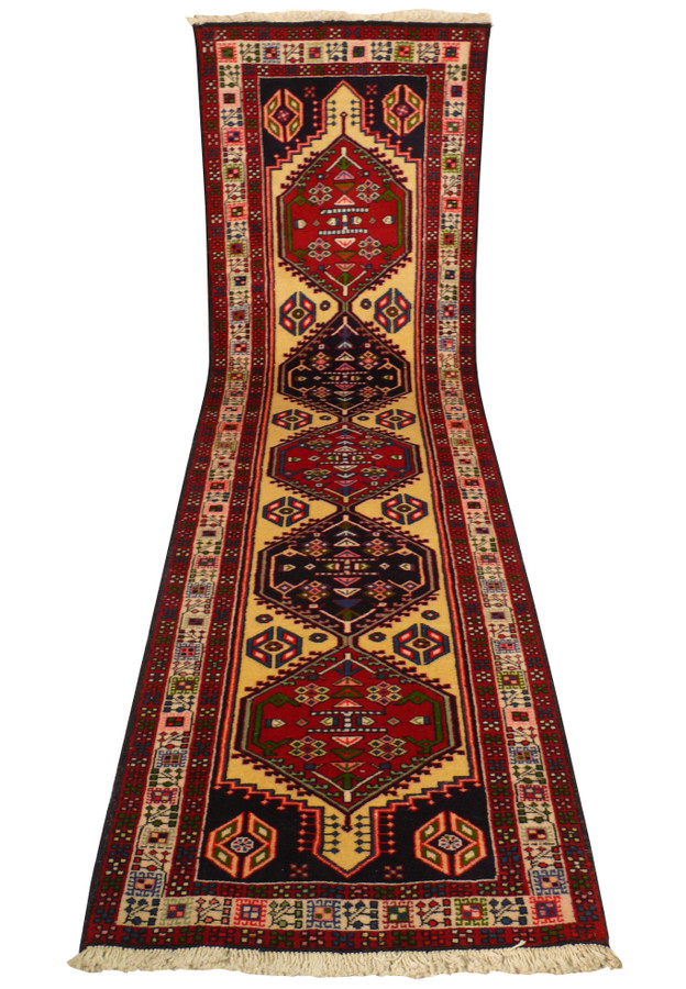 2'7 x 9'6 Persian Yalameh Runner Rug - Angled view highlighting the rug's texture and detailed motifs