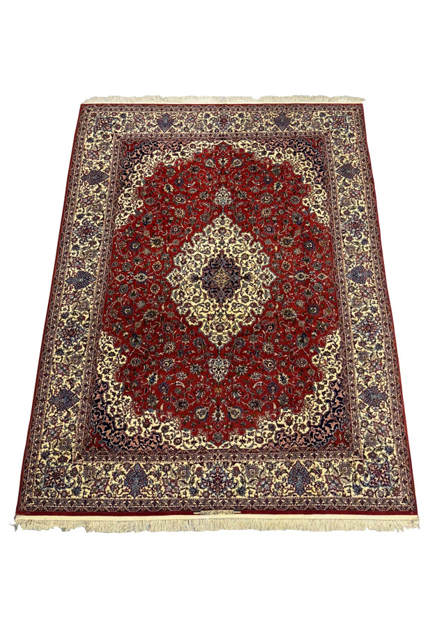 Angled view of Persian Isfahan Silk Rug showcasing intricate design
