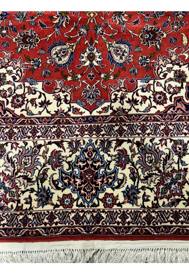Angled view showing the texture of Persian Isfahan Silk Rug