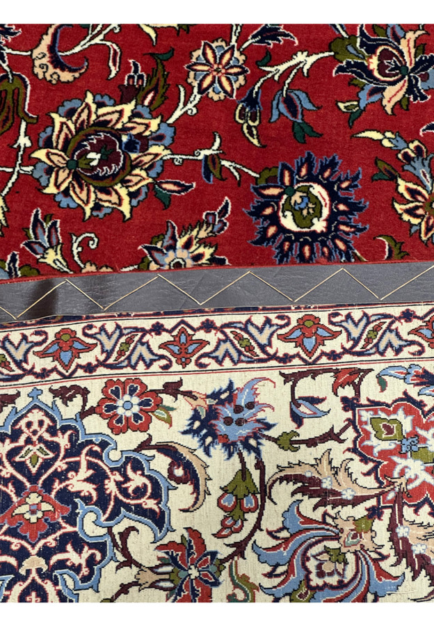 Detailed view of floral motifs on the back of Persian Isfahan Silk Rug.