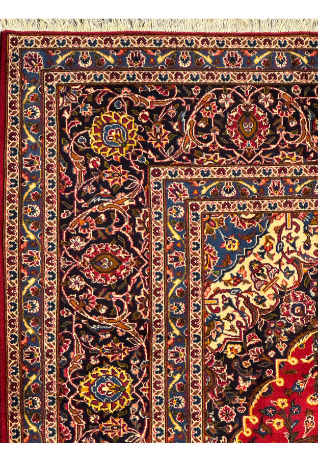 Detailed shot of the border patterns on the Persian Kashan Rug, highlighting the craftsmanship and intricate designs.
