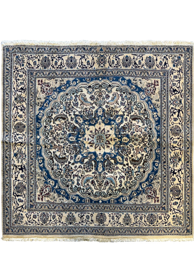 Overhead view of a 6'3 x 6'7 Persian Nain Square Rug featuring intricate blue and ivory floral patterns with a central medallion.