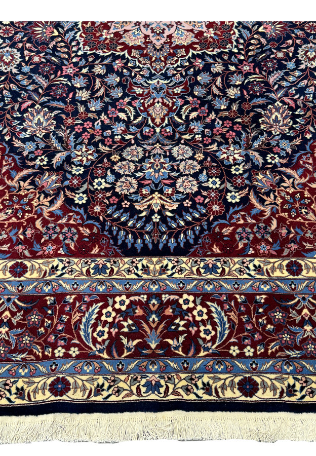 Lower Edge border of Isfahan 6x9 Isfahan Persian Rug with deep red, ivory and navy blue mixes.