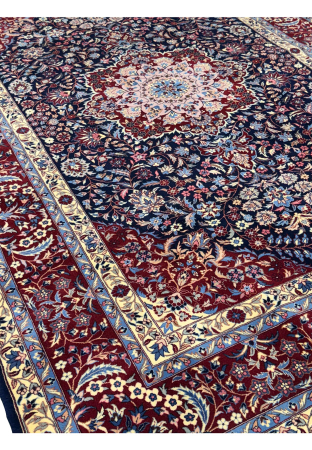 Side view of an 6x9 Persian Isfahan Wool and silk rug, highlighting its intricate patterns and vibrant colors.