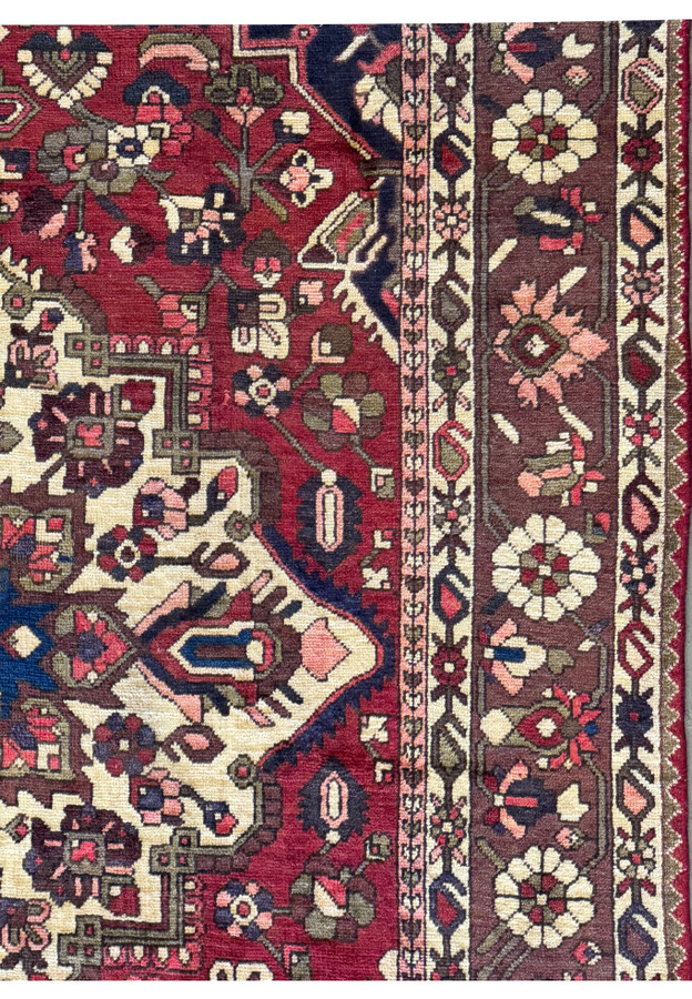 Close-up of the weave and texture of the 6'6" x 10' Persian Bakhtiar rug showcasing the high-quality wool and intricate design.