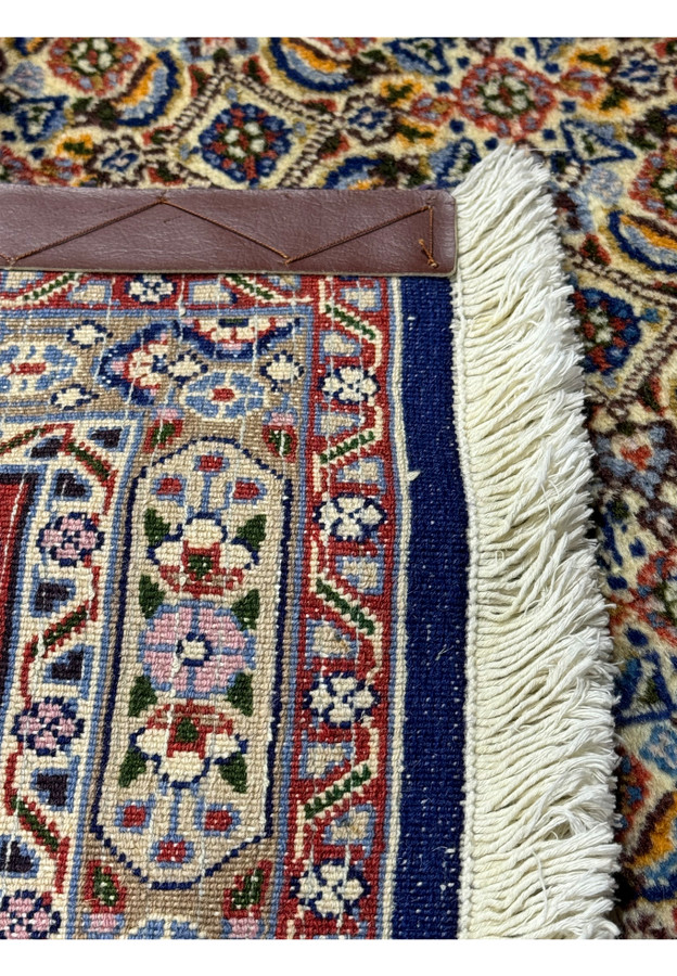 Zoomed into the back of this 7x7 Persian Moud Square Rug showing the high quality weave.
