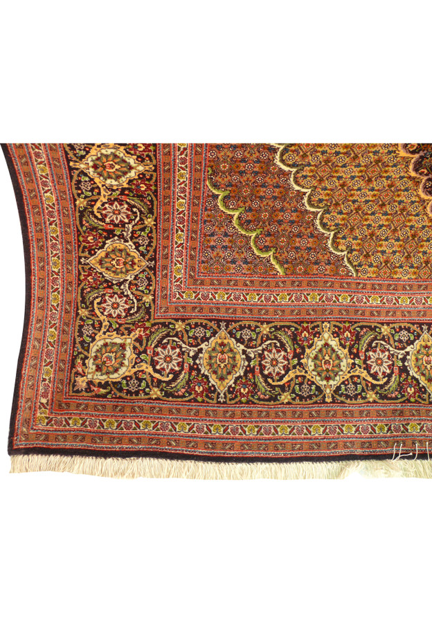 Luxurious texture of Tabriz Mahi Rug made from wool and silk