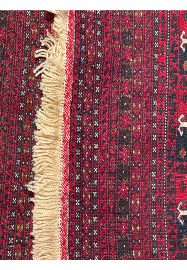 back of 3'6 x 4'9 Persian Baluch Rug indicating handmade quality.