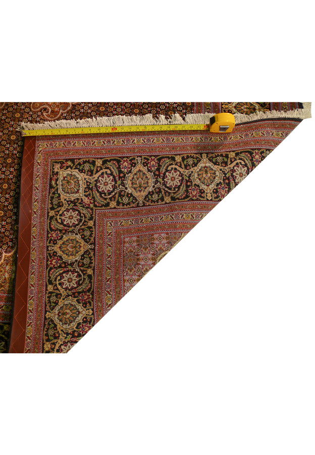 Backside of 6'8 x 9'6 Tabriz Mahi 50 Raj Persian Rug with a measuring tape to show the high quality of 50 raj weave.