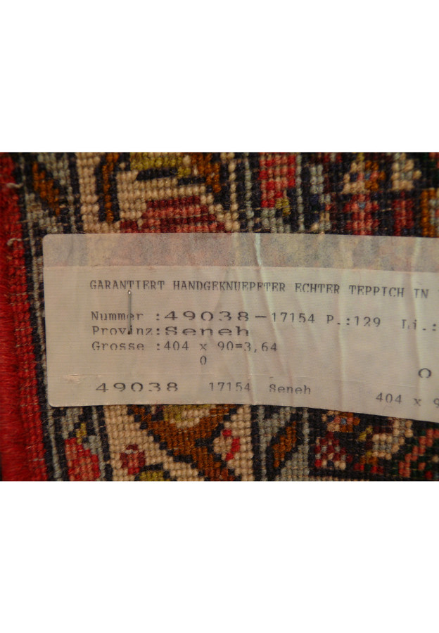Tag of 3 x 13'3 Persian Senneh Runner with size and origin details