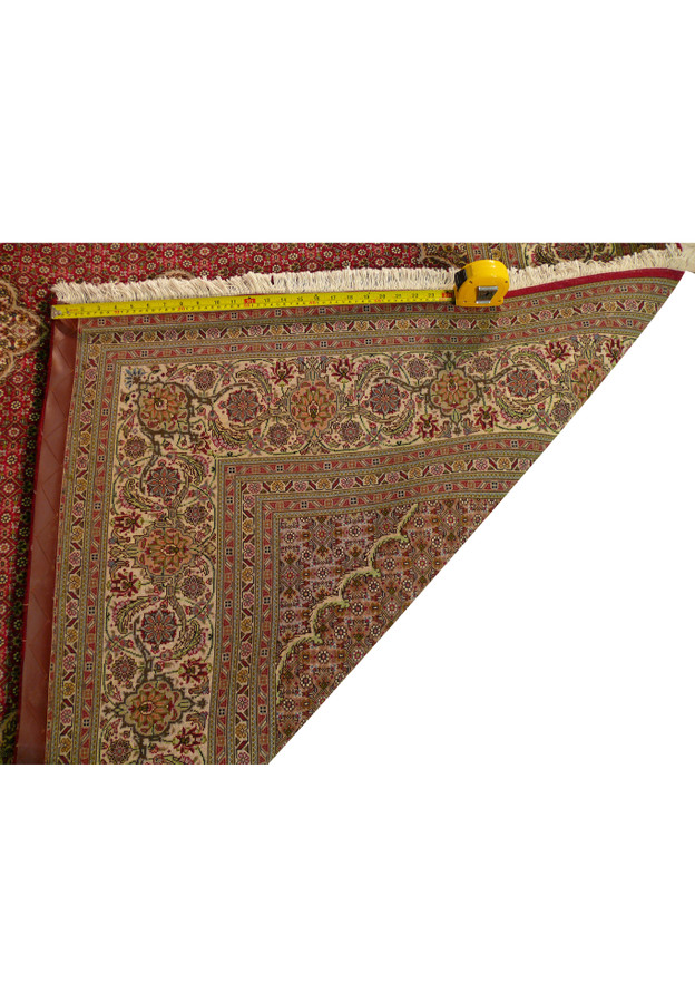 Backside view of the 6'8 x 10 Persian Tabriz Mahi Rug, showcasing the high knot density and fine craftsmanship.