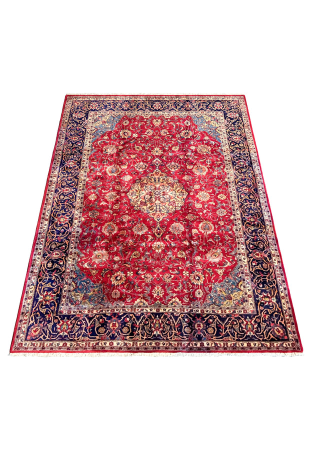 Laid down view of the 9 x 13 Persian Sarough Rug highlighting the central medallion and intricate designs in vivid colors
