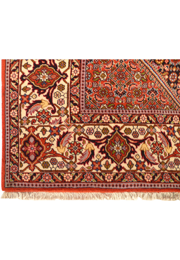Zoomed-in view of border on 6'6 x 10'2 Bijar Persian Rug showcasing floral motifs