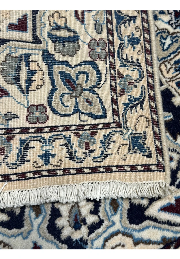 Backside of the 3x5 Persian Nain rug highlighting the handwoven craftsmanship.