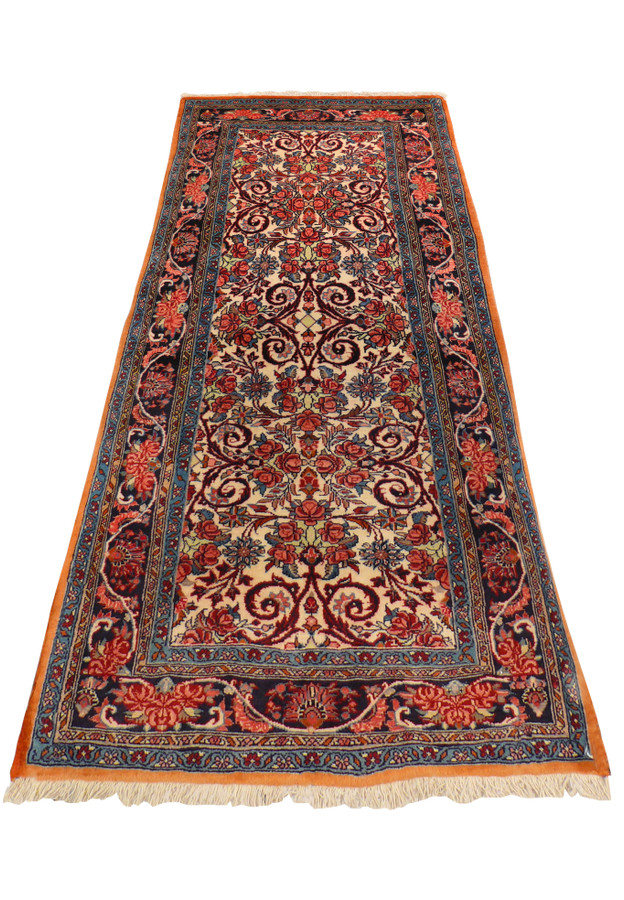 Laid down view of 2'6 x 6 Persian Bijar Runner highlighting vibrant colors and detailed motifs.