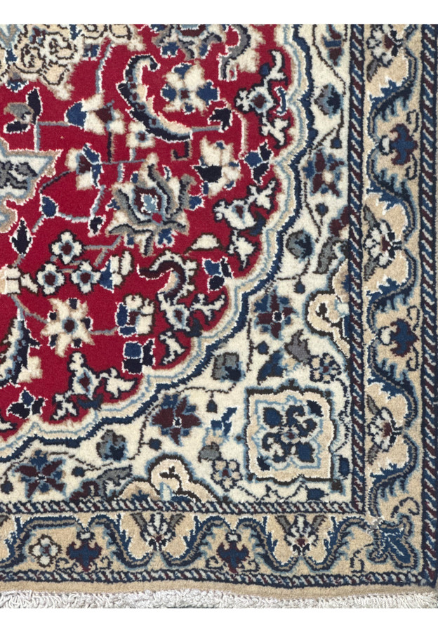 Edge view of the 3 x 4.6 Red Nain Persian Rug showing the intricate border design and craftsmanship