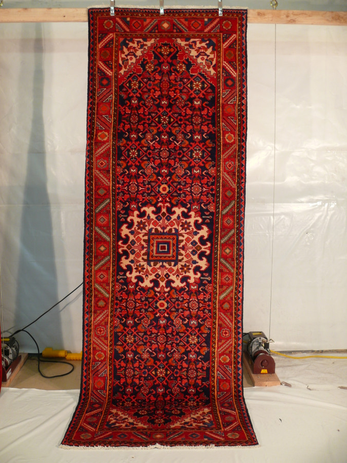 3'6 x 10'6 Persian Hamedan Runner displayed hanging showcasing intricate design and vibrant colors.