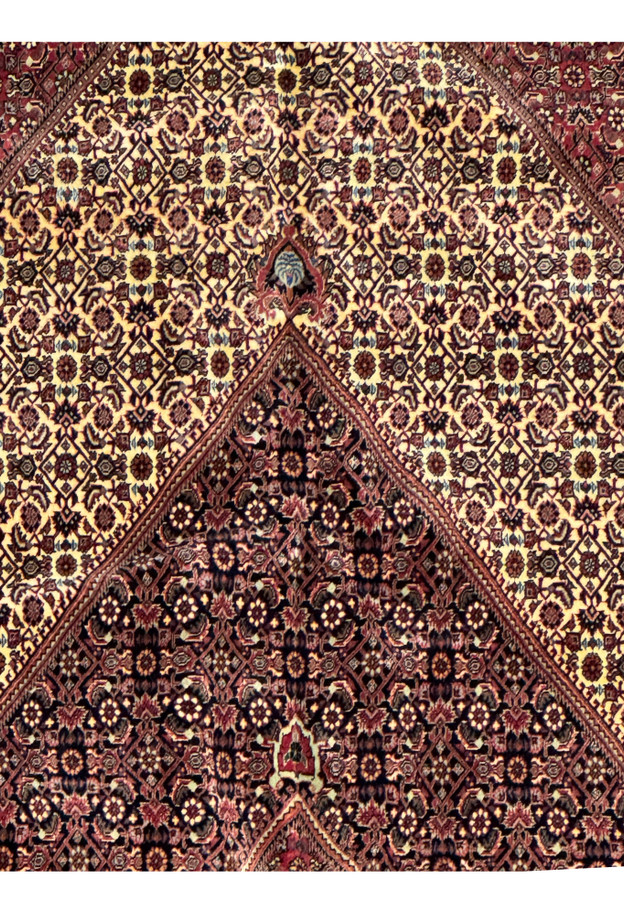 Midfield section of 13 x 20 Persian Bijar Rug with dense floral pattern and rich color palette.