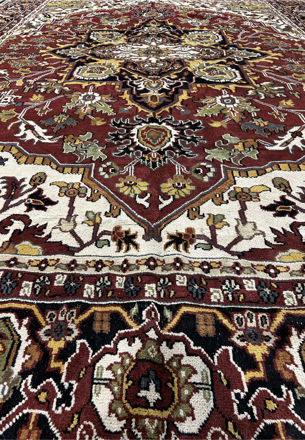 Midfield view of the 12 x 16 Oriental Heriz Rug, focusing on the central medallion and surrounding motifs.