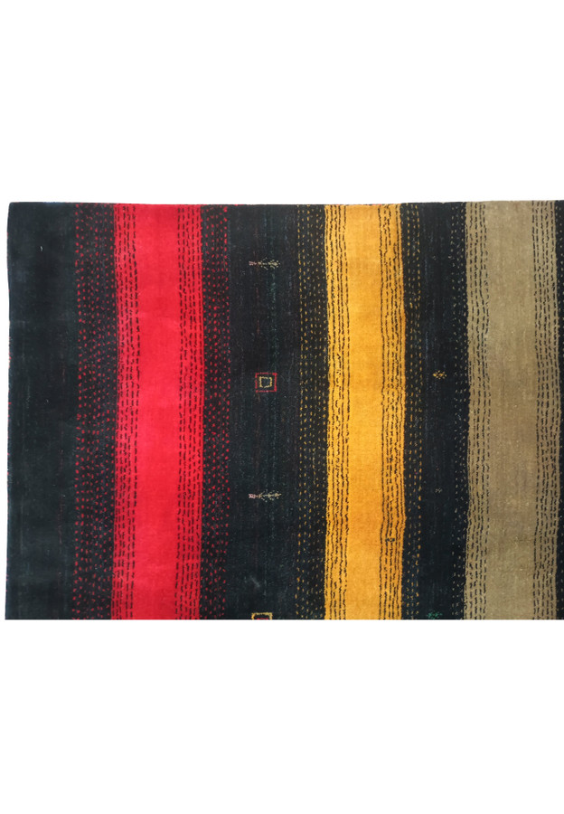 Detailed close-up of the design on the 8'3" x 9'11" Gabbeh rug.