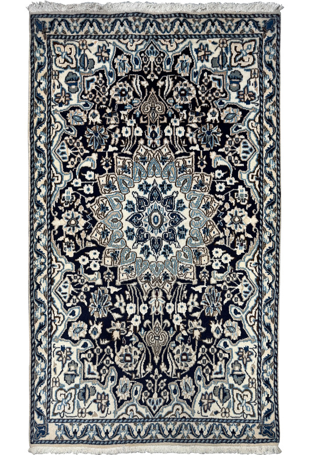 Full view of a 3x5 Nain Persian rug showcasing its intricate floral and geometric design