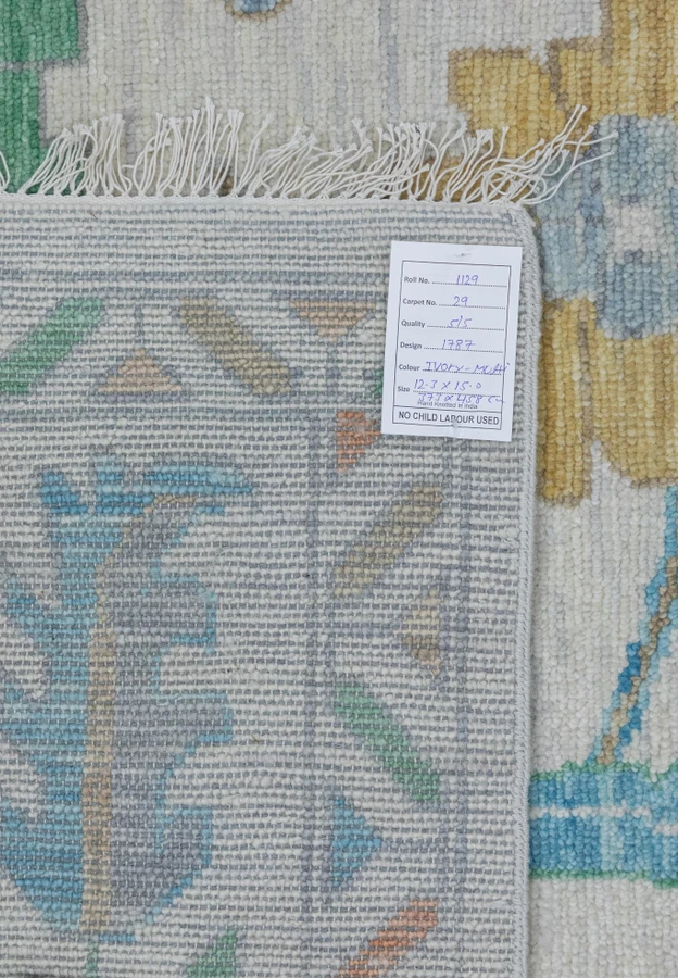 Backside of this 12x15 Turkish oushak rug emphasizing the high quality modern weave