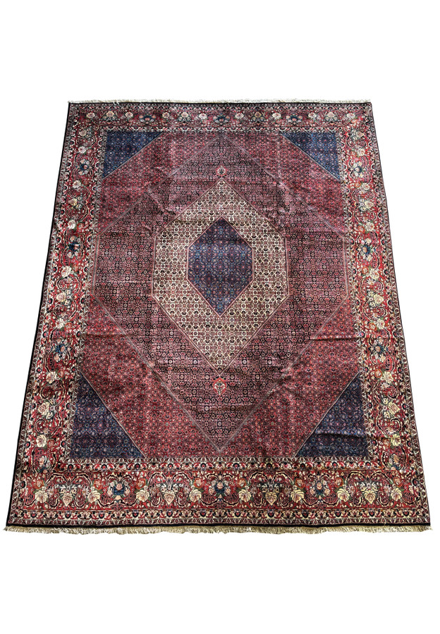 Full display of 10 x 13 Persian Bijar rug's rich colors and traditional designs.