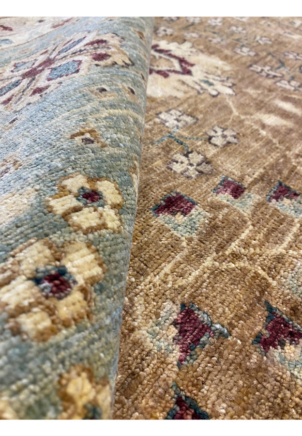 Rolled texture view of this beautiful 12x16 Ziglar Oriental Rug