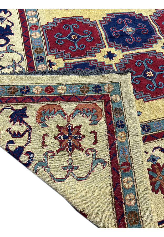 Backside of 13'3 x 16'2 Afghan Rug displaying the high-quality hand-knotted construction and wool material.