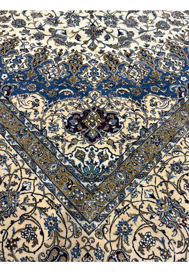 Detailed view of the border on the 16' x 16' Persian Nain rug with beige, navy, and taupe accents.