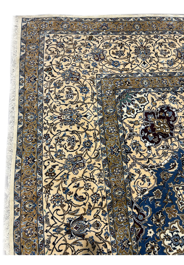 Detailed view of the border on the 16' x 16' Persian Nain rug with beige, navy, and taupe accents.
