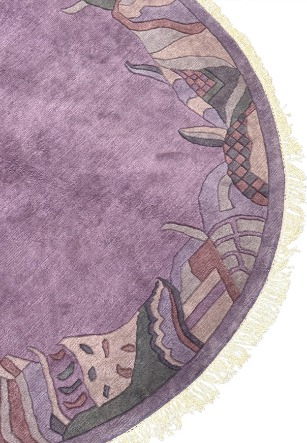 Side view of 7'3 x 7'3 Nepali Art Deco Round Rug, showcasing its luxurious Tibetan wool texture and detailed border