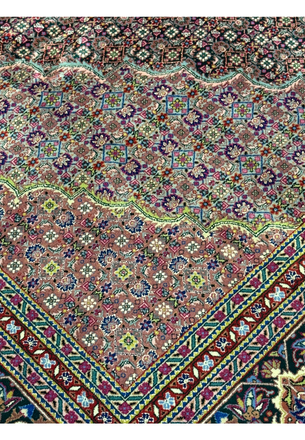 Inner border section showing fine detailing of floral and geometric motifs.
