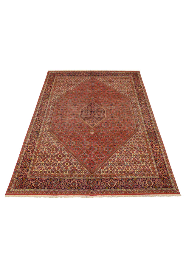 8 x 11'1 Persian Bijar Rug handwoven with a geometric medallion and floral motifs in deep rust, navy, and cream tones.
