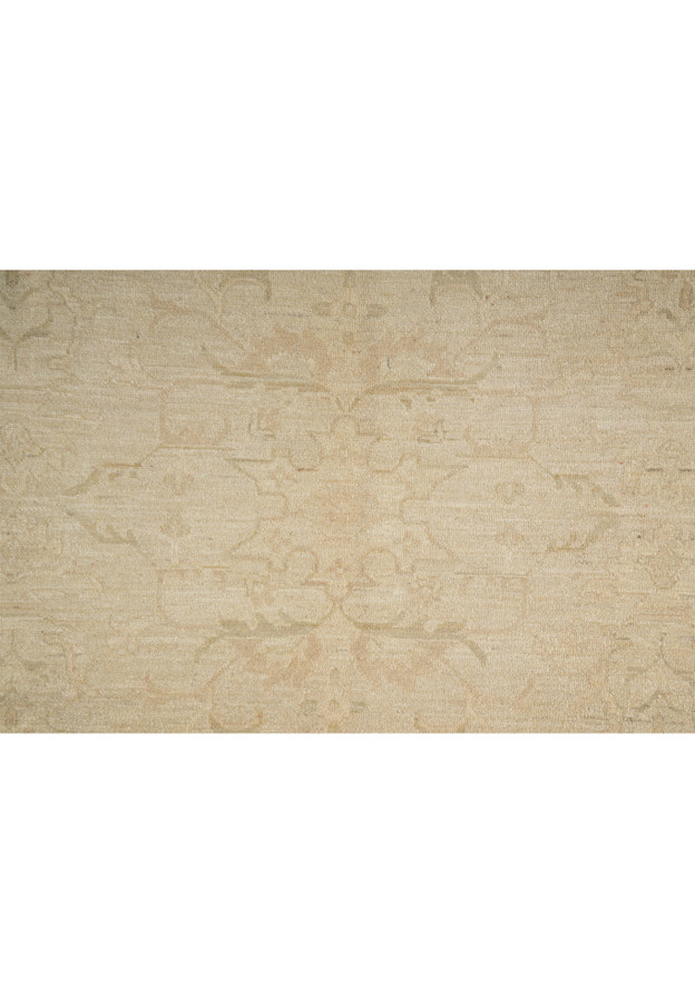 Detailed image of central medallion on Chobi rug, displaying soft floral and geometric motifs in a neutral palette.