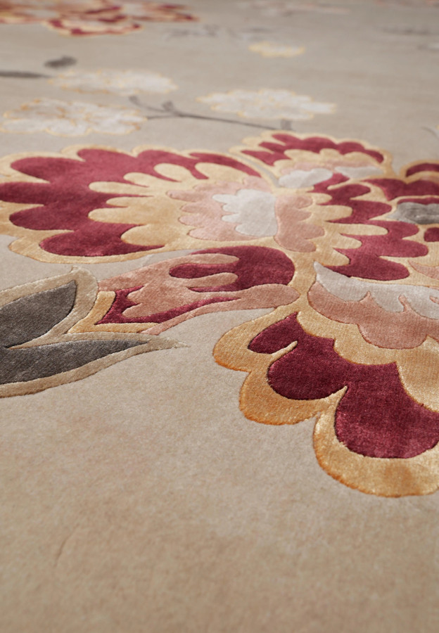 Burgundy and gold silk flower motif on modern hand-knotted Tibetan rug