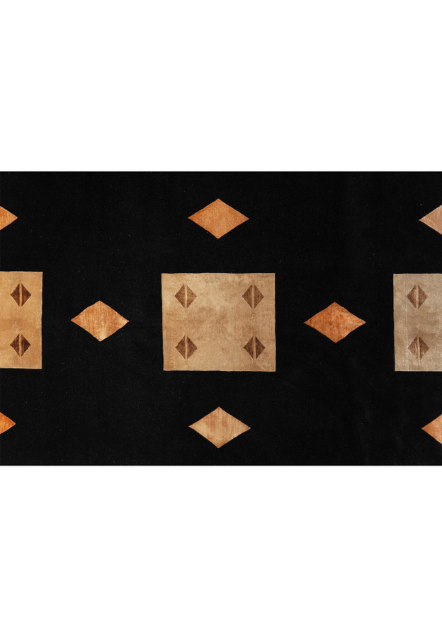 Detailed section of rug highlighting transitions between wool and silk textures and refined shading