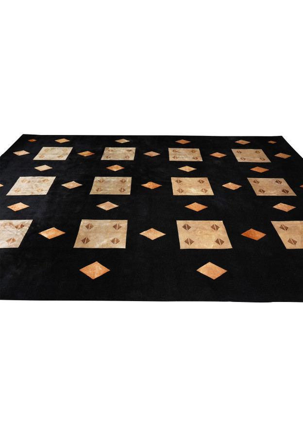 Side angle of large modern rug highlighting low pile height and clean edging details
