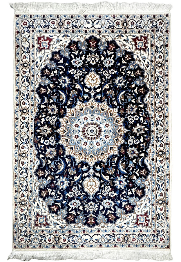 Full view of 3'9 x 5'8 Persian Nain rug with navy blue background and ivory floral medallion