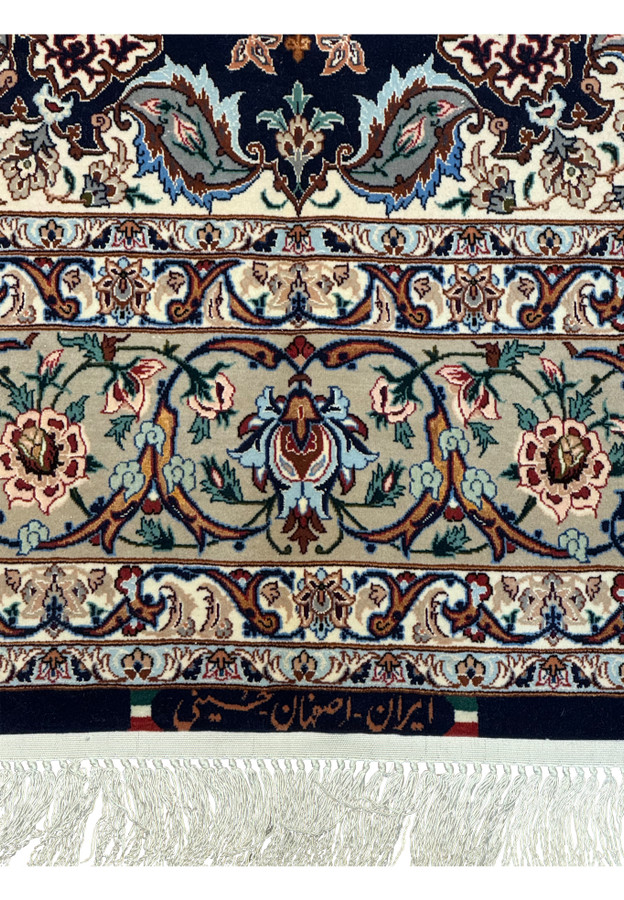 Signed Persian Isfahan rug with Heydari weaver name and Iran Esfahan inscription on silk end panel