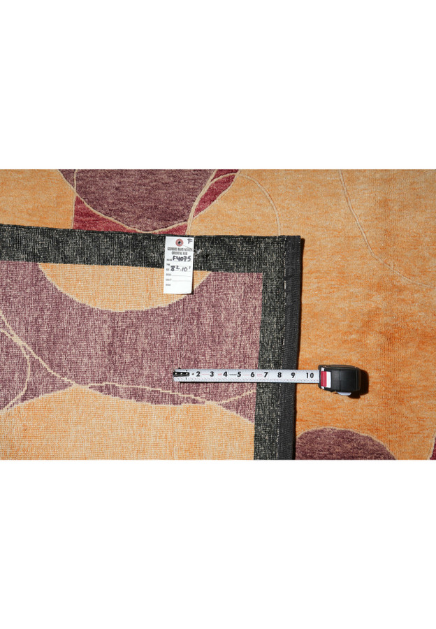 Backside image revealing the clean, detailed knot structure and subtle tonal variations, a hallmark of authentic handwoven Tibetan wool rugs crafted with meticulous attention.