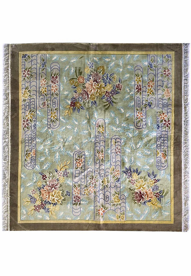 Full view of the 8x8 Vintage Oriental Art Deco Square Rug showing its sage green background, pastel blue scrollwork, and multi-colored floral bouquets hand-knotted in wool with taupe border and ivory fringe.